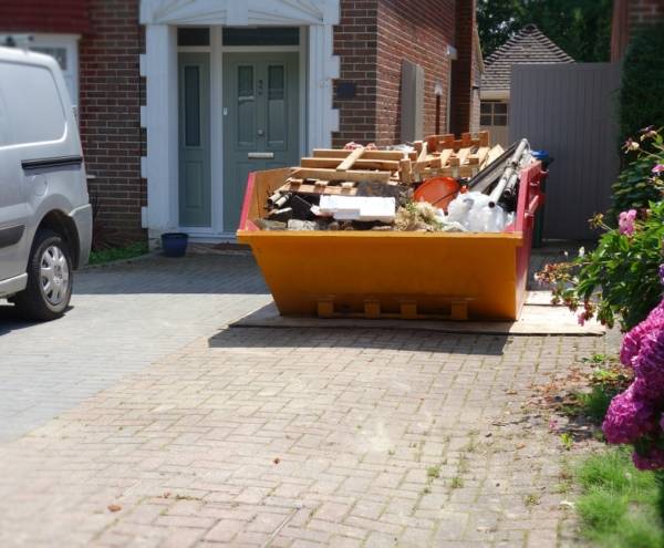 Loaded Skip On Driveway