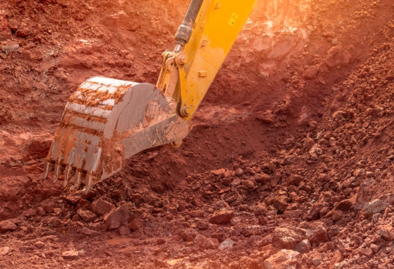 digger digging up soil